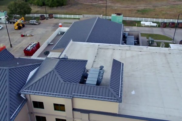 A large hotel with roofing installed by Brose Construction.