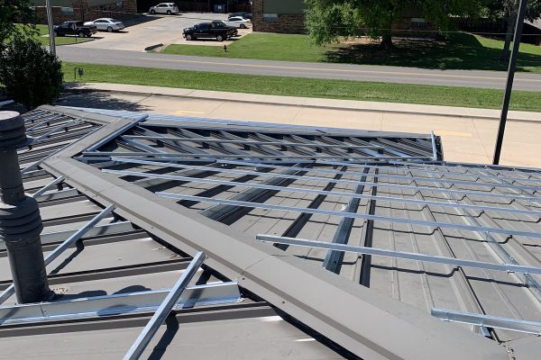 Standing seam retrofit roof installed by Brose Construction.