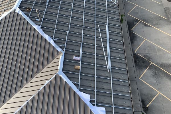 Standing seam retrofit roof installed by Brose Construction.