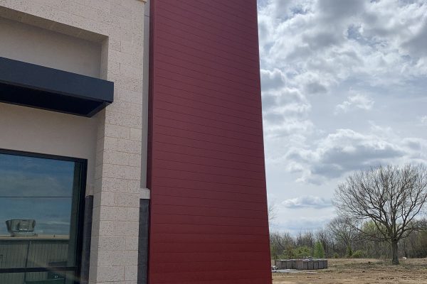 Extruded aluminum siding installed by Brose Construction.